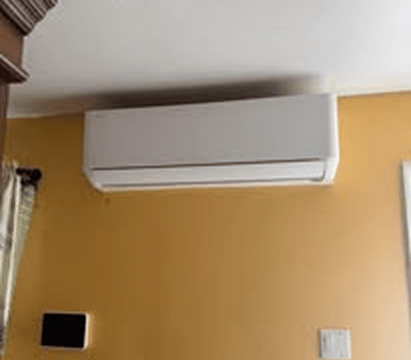 White AC unit in living room