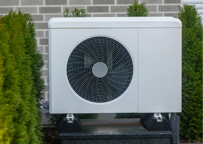 Technician repairing air conditioning unit